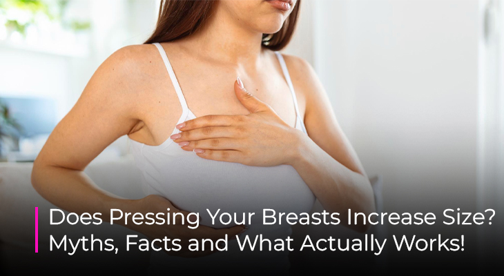 Woman touching breast area while researching whether pressing your breasts increases size naturally